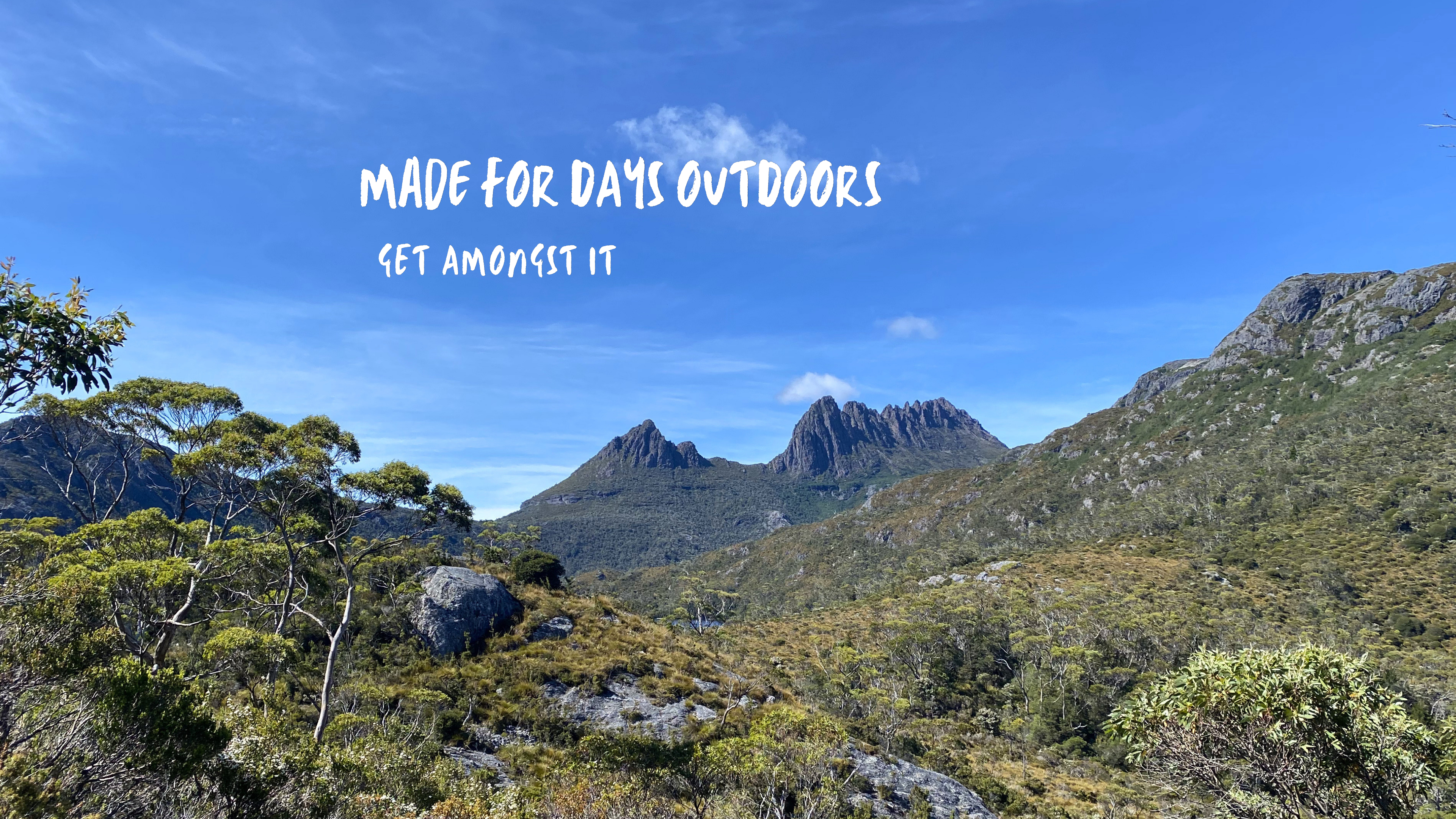 View of Cradle Mountain and surrounding alpine landscape in Tasmania, Australia.